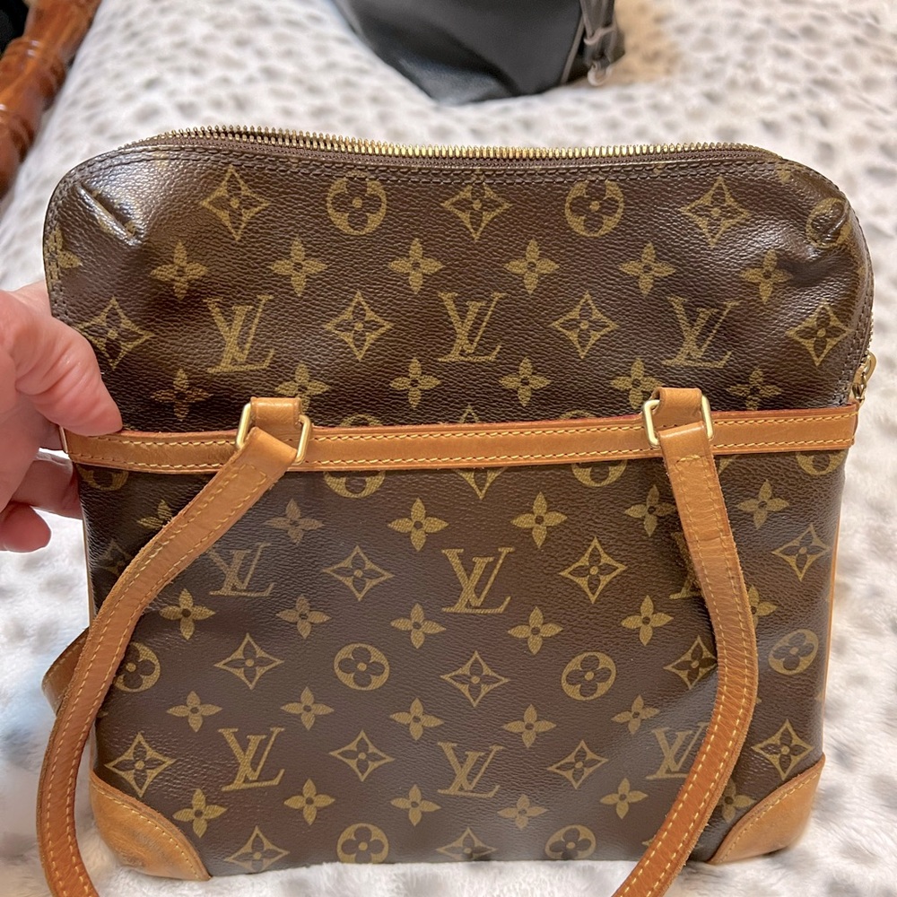 LV has dust bag, original papers see photos all information of authenticity.